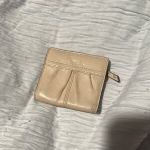 Coach Tan Leather Wallet with Zipper Closure and Pleated Design